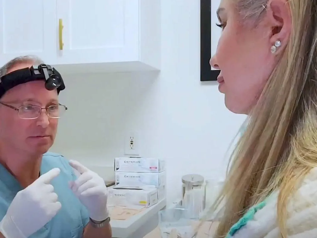 Clinician performing an in-office snoring procedure